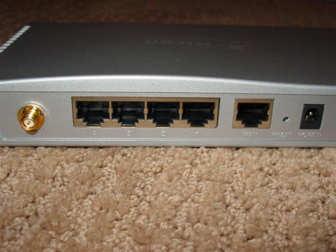 X-Micro WLAN 11g Turbo Mode Broadband Router and PCMCIA card