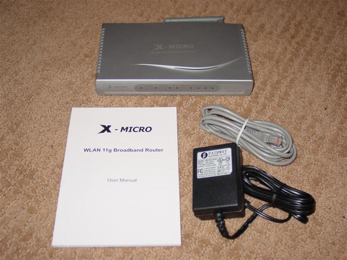 X-Micro WLAN 11g Turbo Mode Broadband Router and PCMCIA card