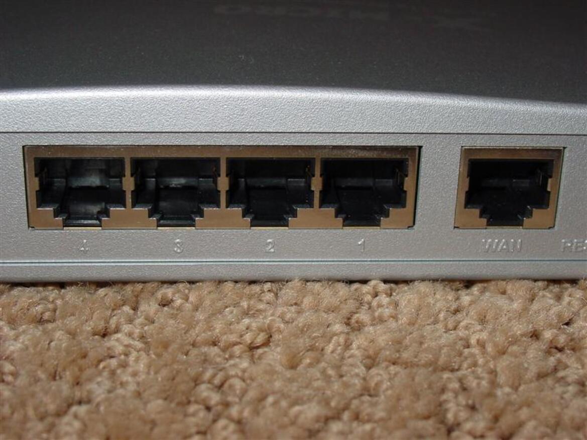 X-Micro WLAN 11g Turbo Mode Broadband Router and PCMCIA card