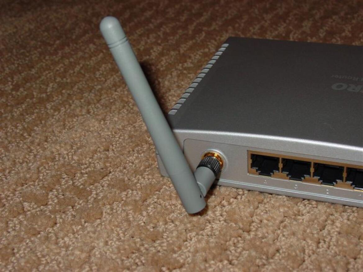 X-Micro WLAN 11g Turbo Mode Broadband Router and PCMCIA card