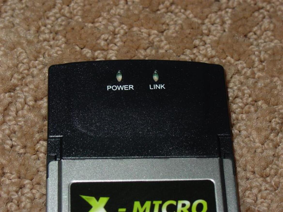 X-Micro WLAN 11g Turbo Mode Broadband Router and PCMCIA card