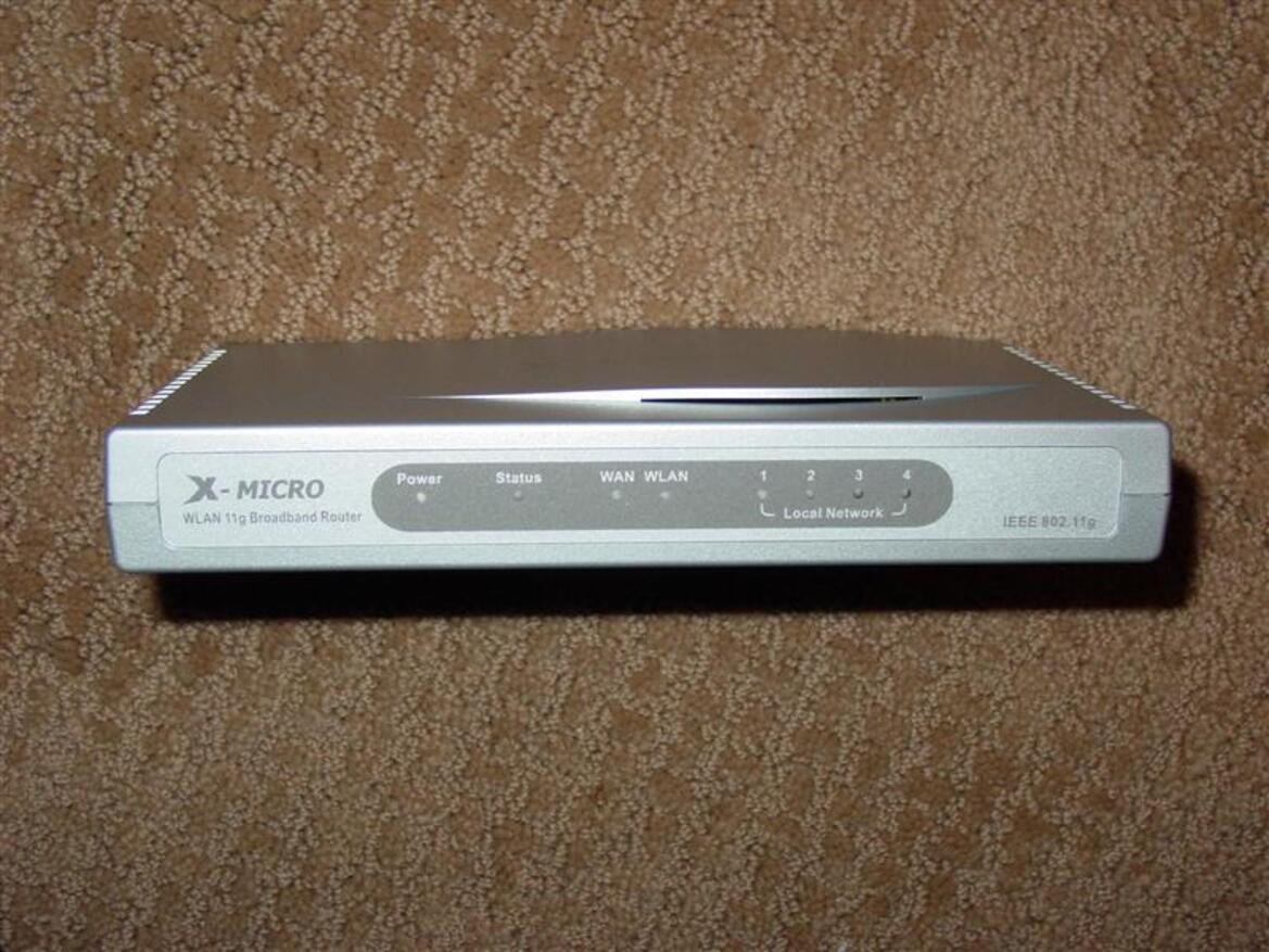 X-Micro WLAN 11g Turbo Mode Broadband Router and PCMCIA card