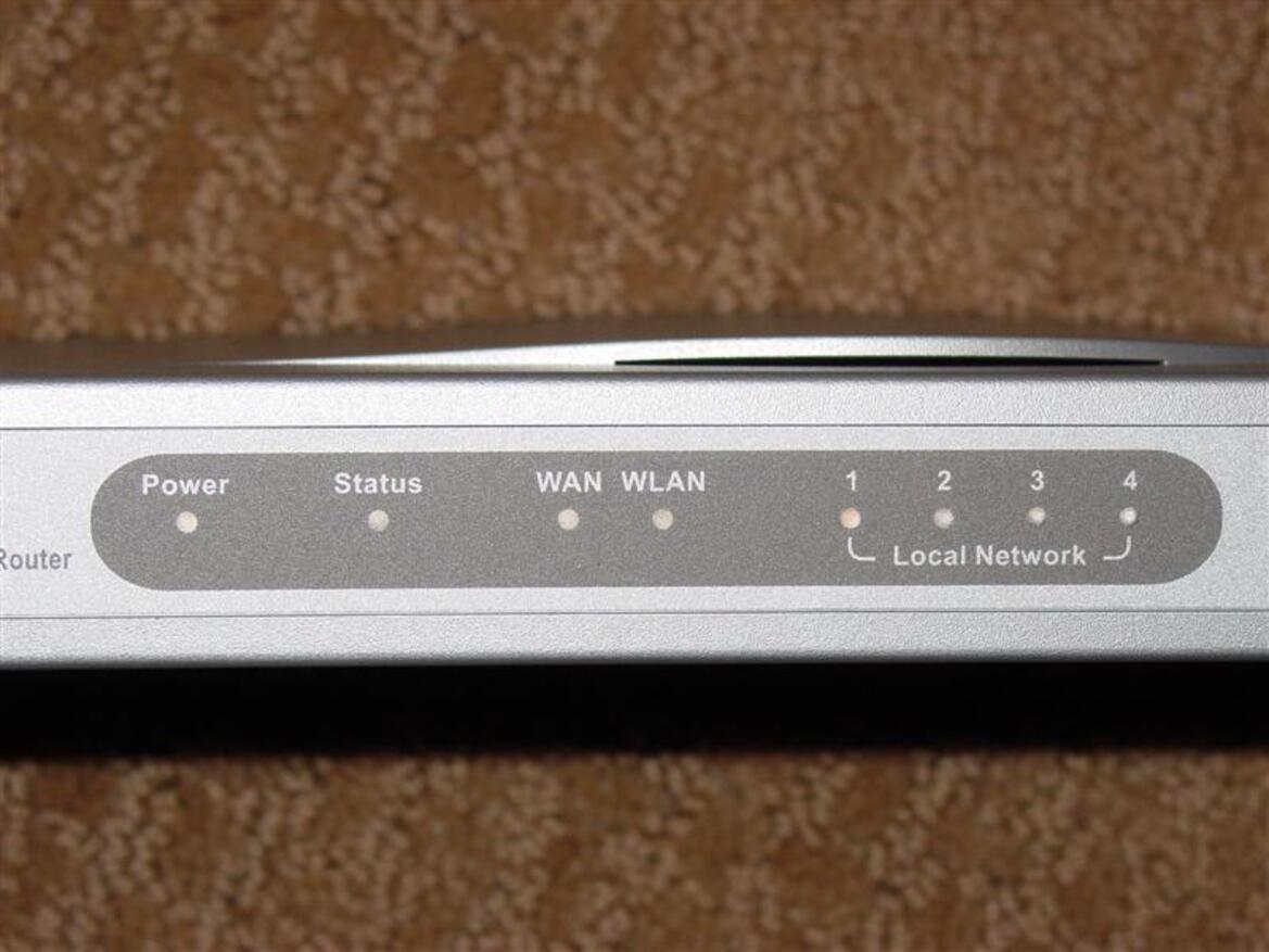 X-Micro WLAN 11g Turbo Mode Broadband Router and PCMCIA card