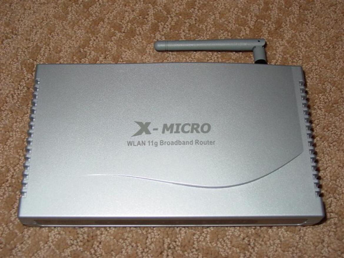 X-Micro WLAN 11g Turbo Mode Broadband Router and PCMCIA card