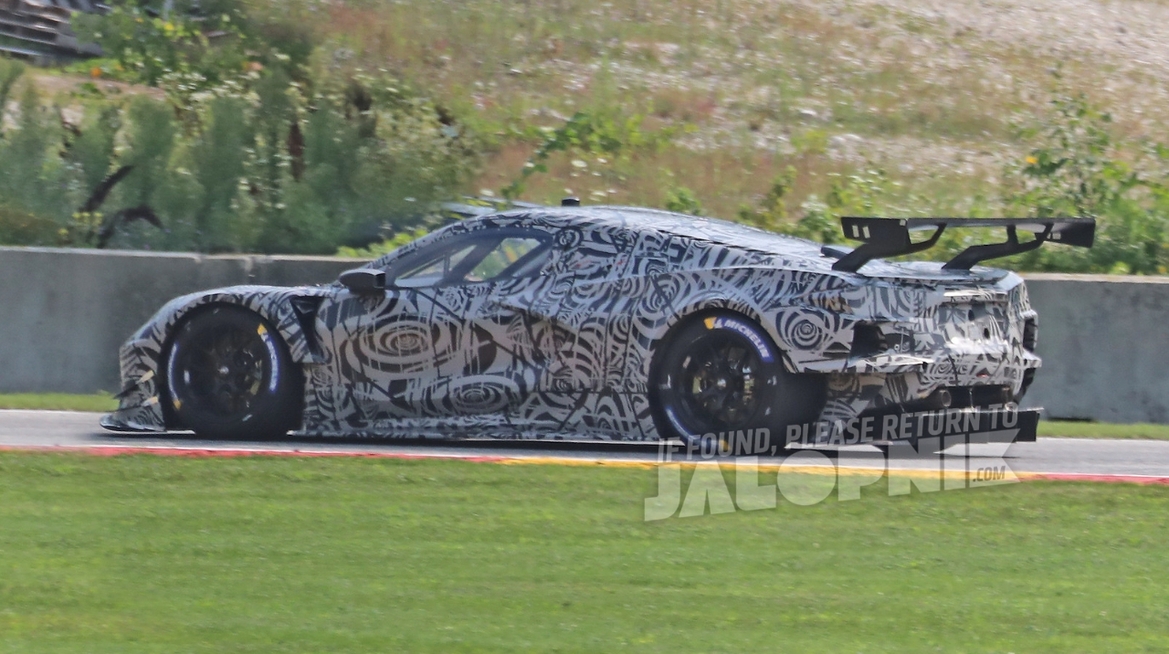 Next-Gen Mid-Engine Chevy Corvette Spied In Sinister C8.R Guise Lapping Road America