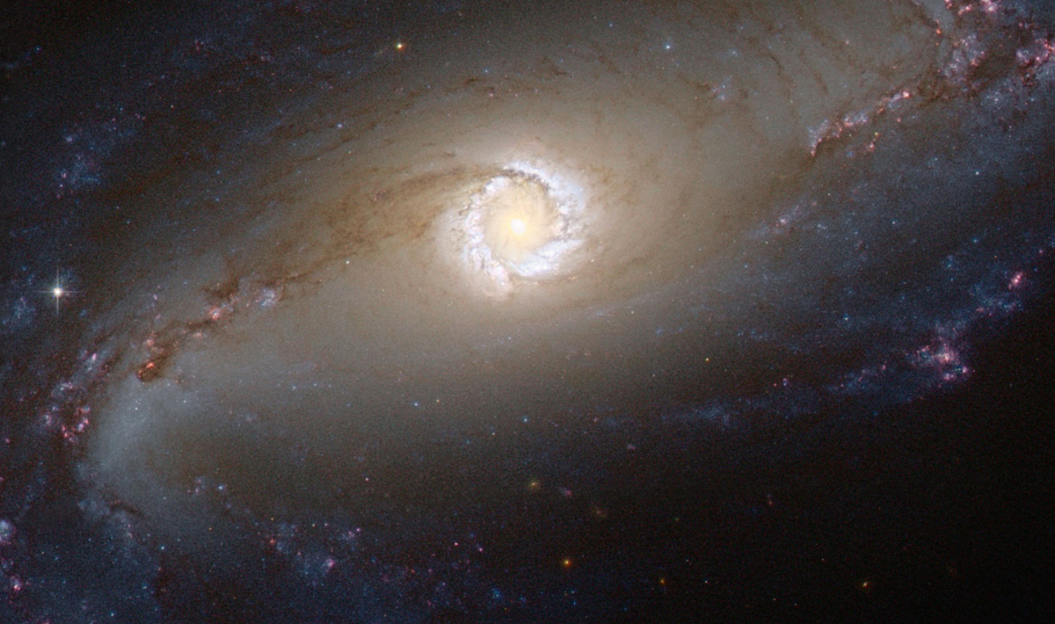 Hubble Telescope Gazes 48M Light Years From Earth And A Gorgeous Galactic Eye Stares Back