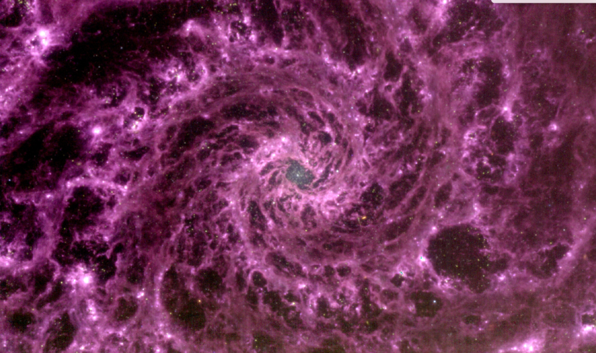 NASA's Space Telescope Shares Hypnotic Image Of Purple Galactic Swirl Chilling In Our Universe