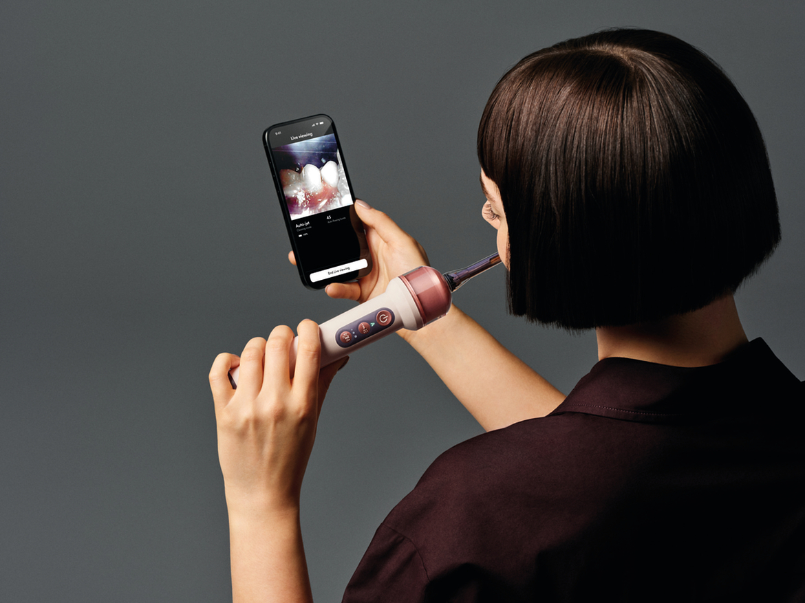 Dyson Built A $499 AI Flossing Toothbrush With A Camera To Blast Away Plaque