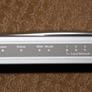 X-Micro WLAN 11g Turbo Mode Broadband Router and PCMCIA card
